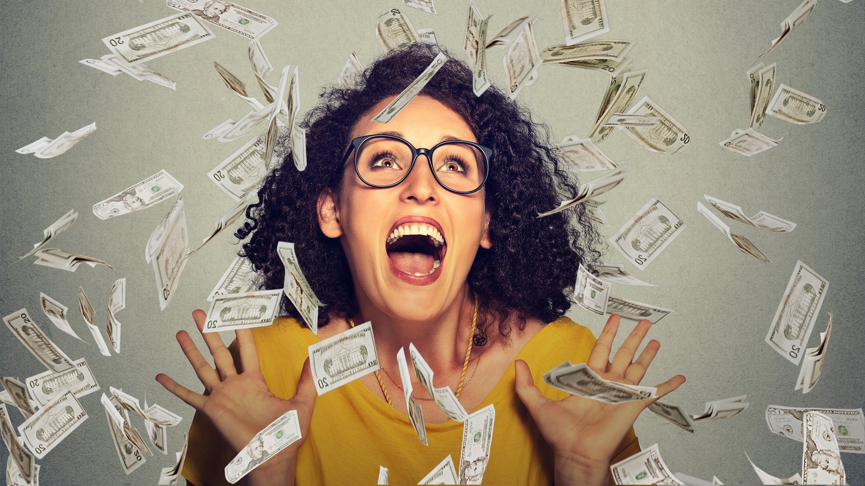 happy woman raining money dreamstime_m_64710344 - Job Crusher